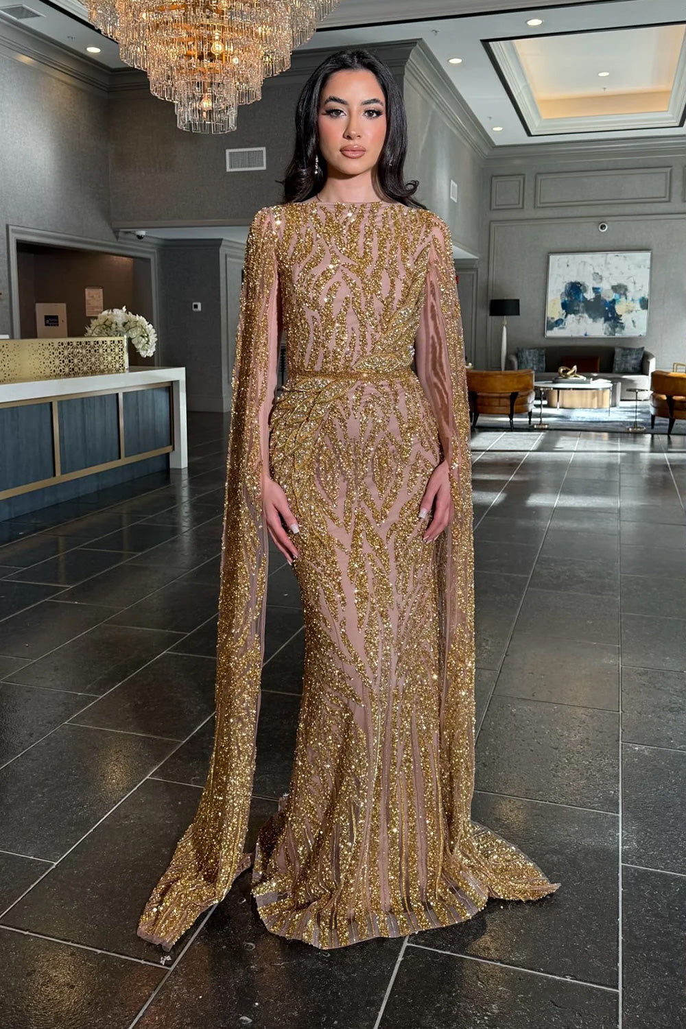 Iyza Belaar cape-sleeve dress collection